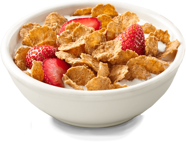 A Bowl Of Cereal With Strawberries And Milk