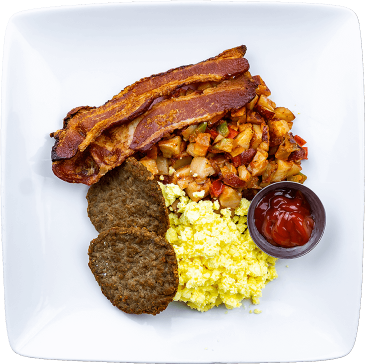 A Plate Of Food With Bacon And Eggs