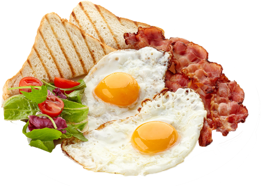 A Plate Of Breakfast With Eggs Bacon And Toast