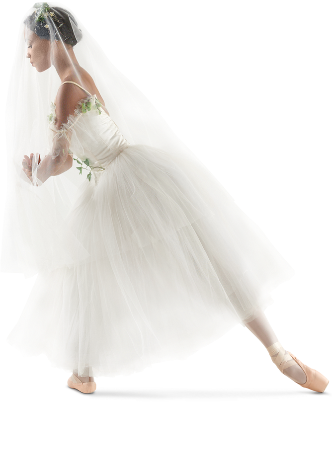 A Woman In A White Dress And Pointe Shoes