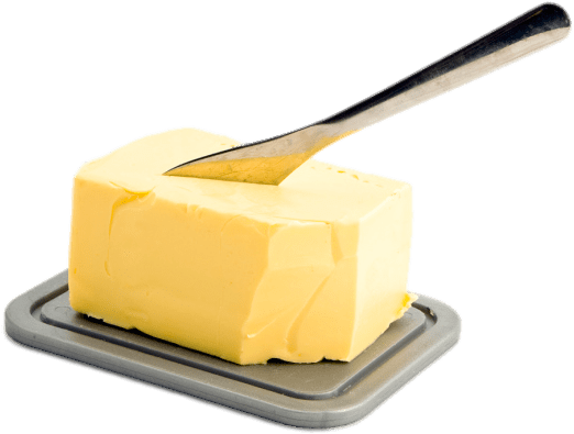 A Knife Sticking Out Of A Block Of Butter