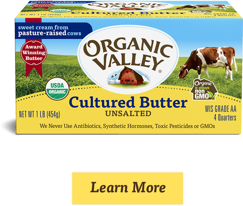 A Box Of Butter With Cows In The Grass