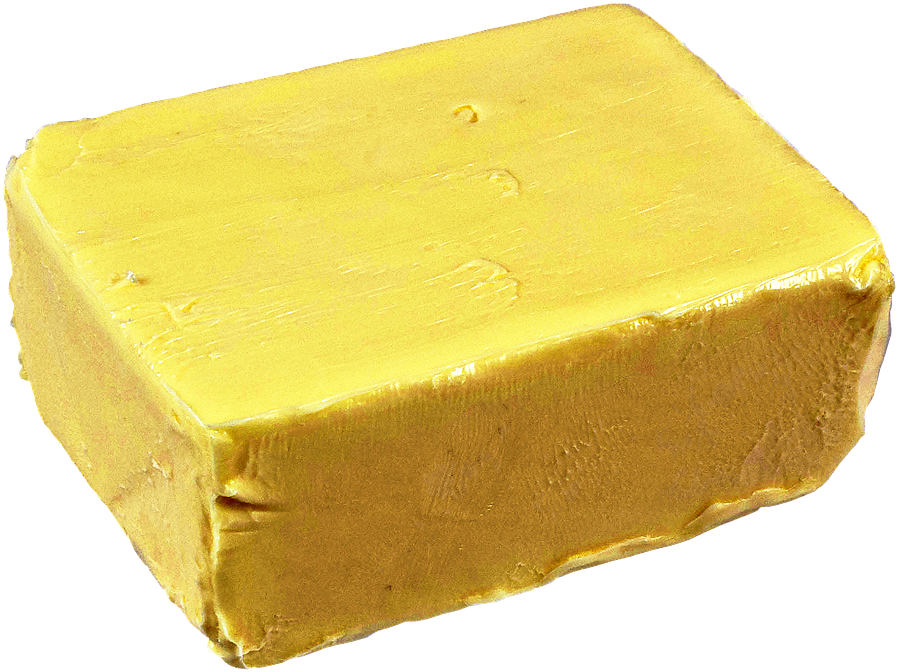 A Block Of Butter On A Black Background