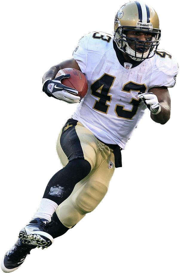 A Football Player Running With A Ball