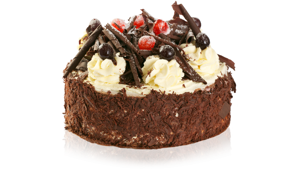 A Chocolate Cake With Whipped Cream And Cherries