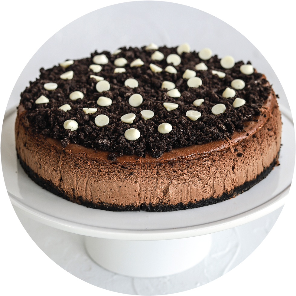 A Chocolate Cake With White Specks On Top