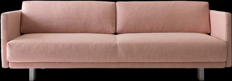 A Pink Couch With Two Pillows