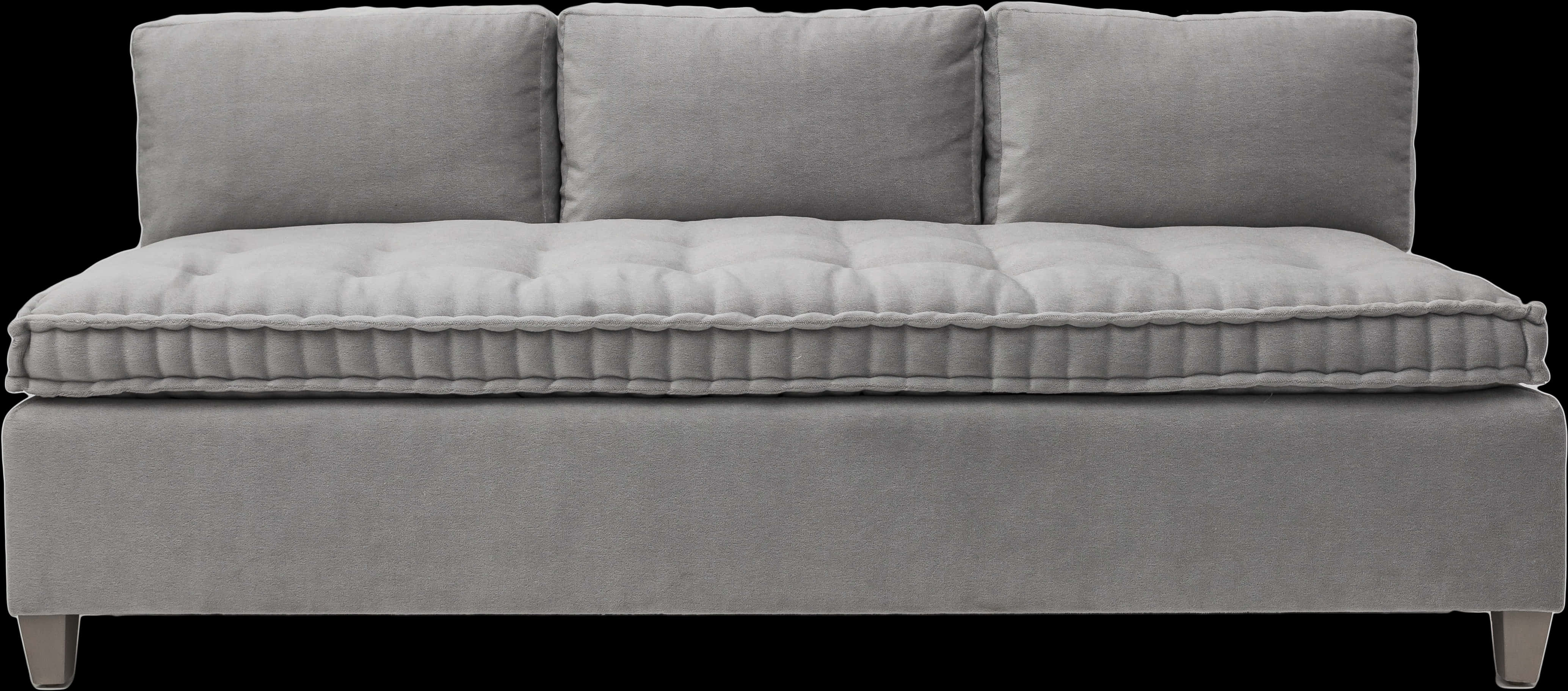 A Grey Couch With Pillows