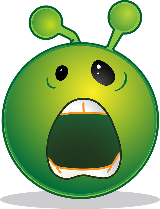 A Cartoon Face Of A Green Alien With A Black Background
