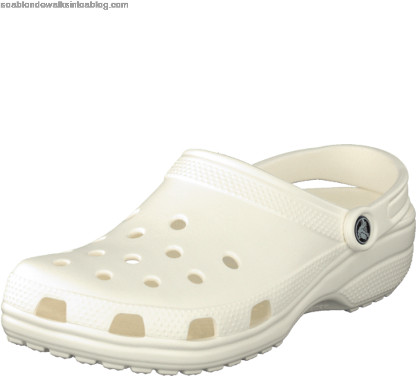 A White Shoe With Holes On It