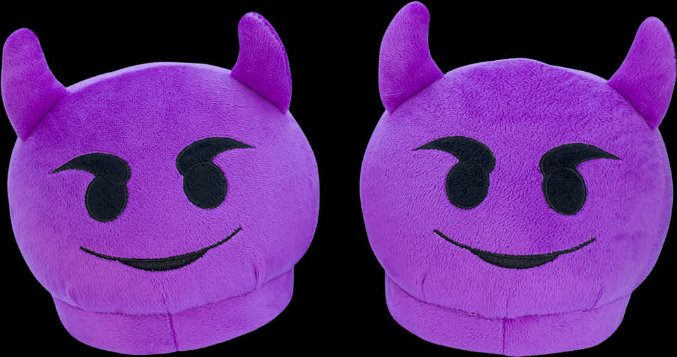 A Pair Of Purple Stuffed Toys
