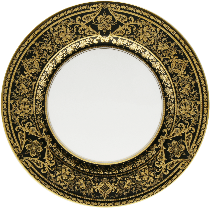 A Gold And Black Plate With A White Circle