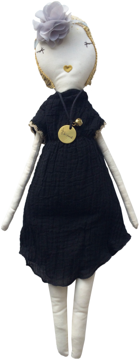 A Black And White Dress With A Gold Tag