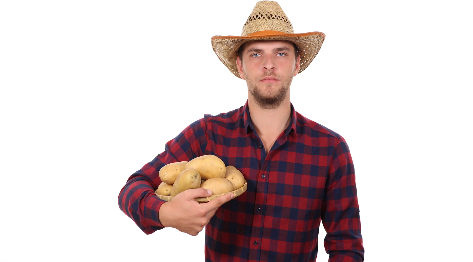 A Man Wearing A Cowboy Hat Holding A Basket Of Potatoes
