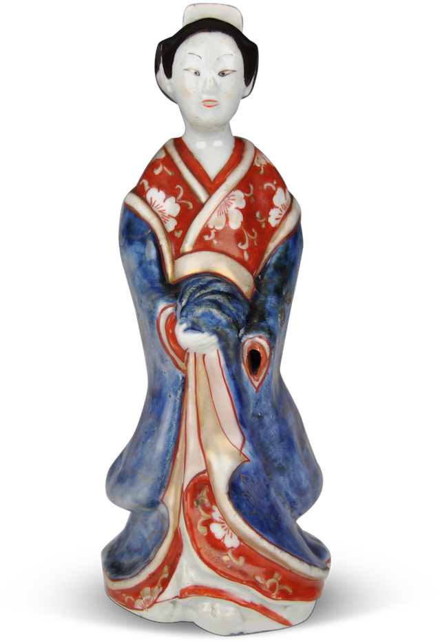 A Statue Of A Woman In A Kimono