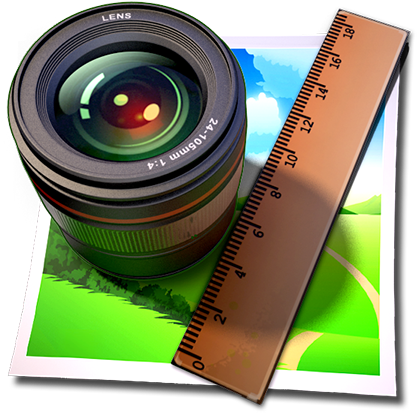 A Camera Lens And Ruler On A Piece Of Paper