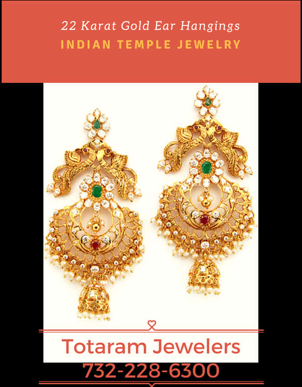 A Pair Of Gold Earrings With Gemstones