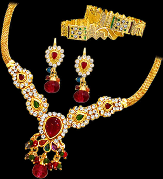 A Gold Necklace And Earrings
