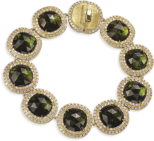 A Gold Bracelet With Green Stones And Diamonds