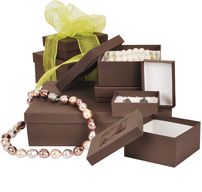 A Group Of Brown Boxes With A Yellow Bow And Pearls
