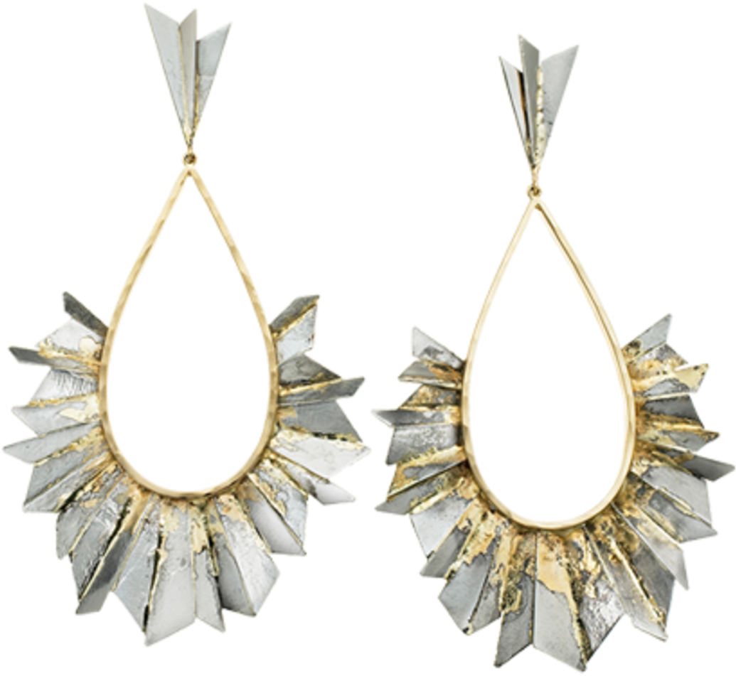 A Pair Of Earrings With Gold And Silver
