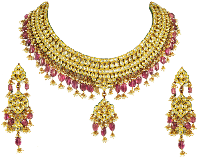 A Close Up Of A Necklace And Earrings