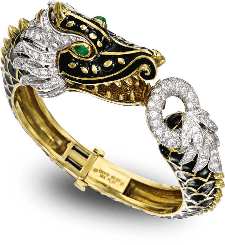 A Gold And Diamond Bracelet With A Dragon Head
