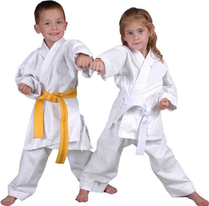 A Boy And Girl In Karate Uniforms