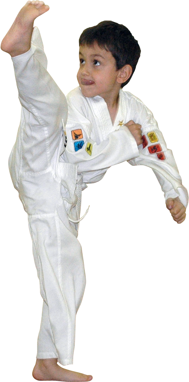 A Boy In A White Uniform Kicking