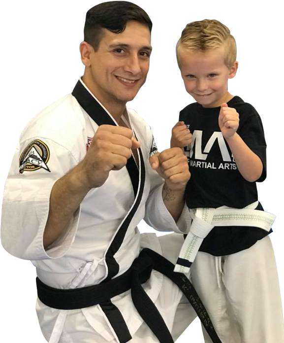 A Man And Boy Wearing Karate Uniforms