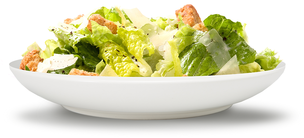 A Bowl Of Salad With Croutons