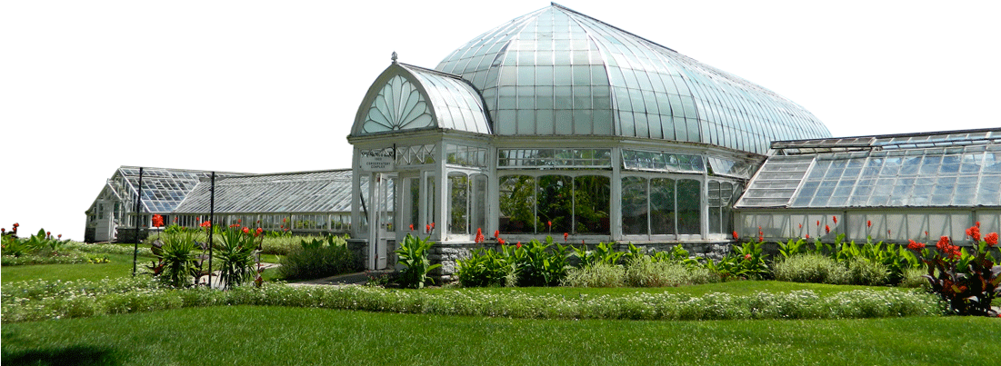 A Glass Building With A Garden