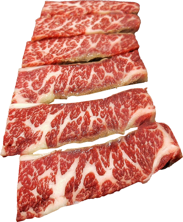 A Group Of Meat On A Black Background