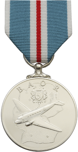 A Silver Medal With A Plane On It