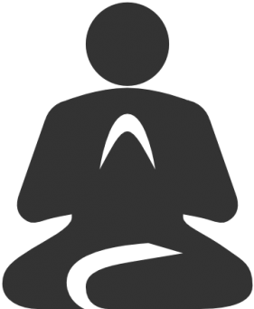 A Person Sitting In A Yoga Pose