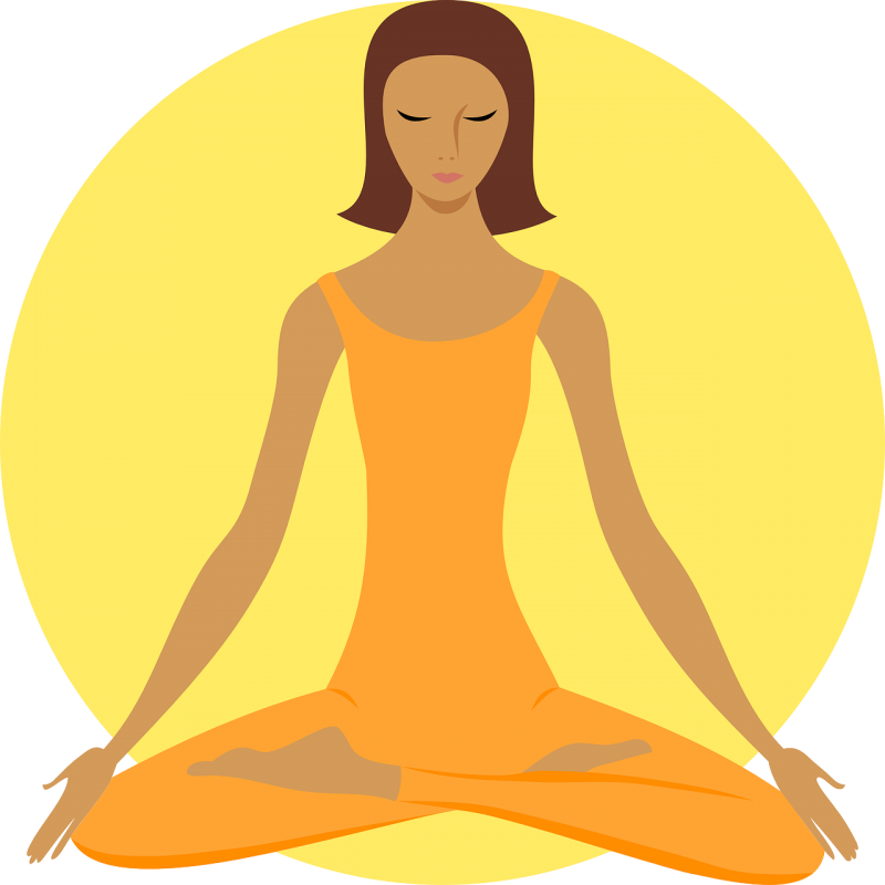 A Woman Sitting In A Lotus Position