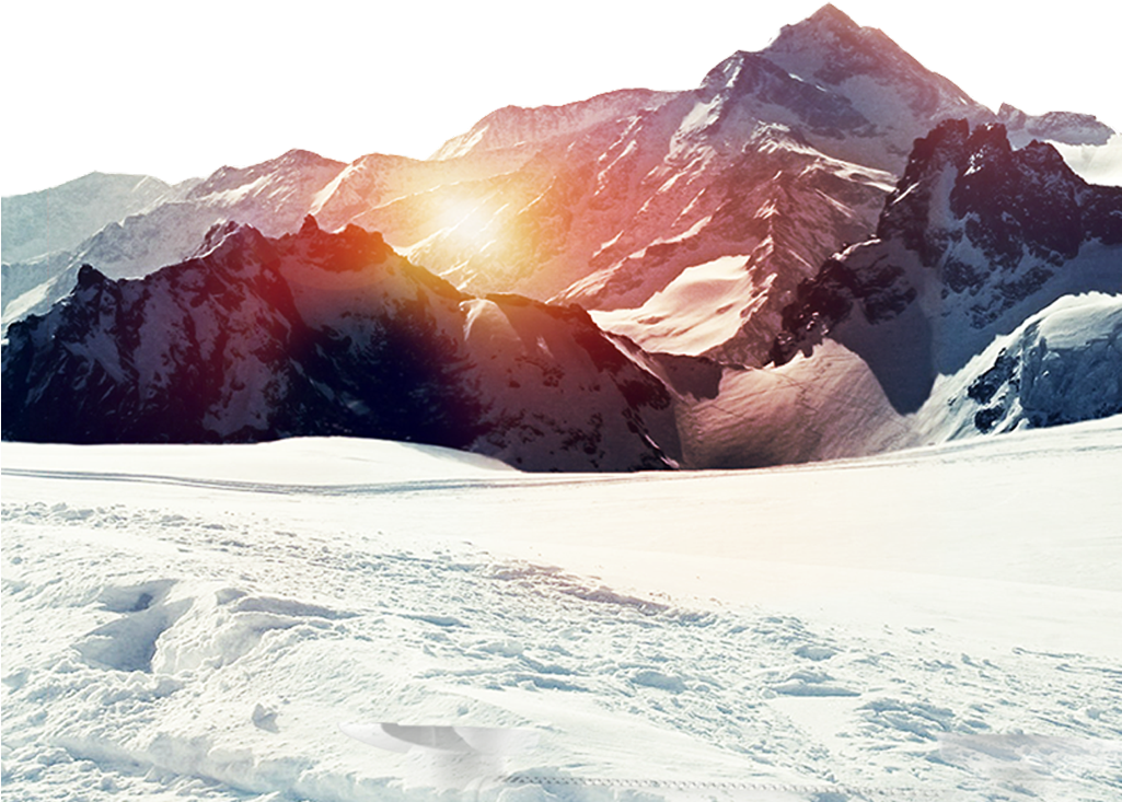 A Snowy Mountain Range With Sun Shining Through
