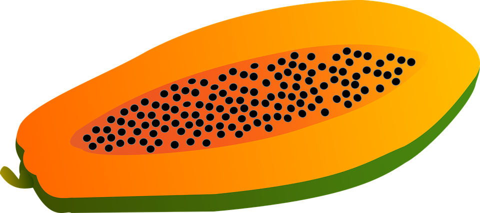 A Cut Papaya With Black Dots