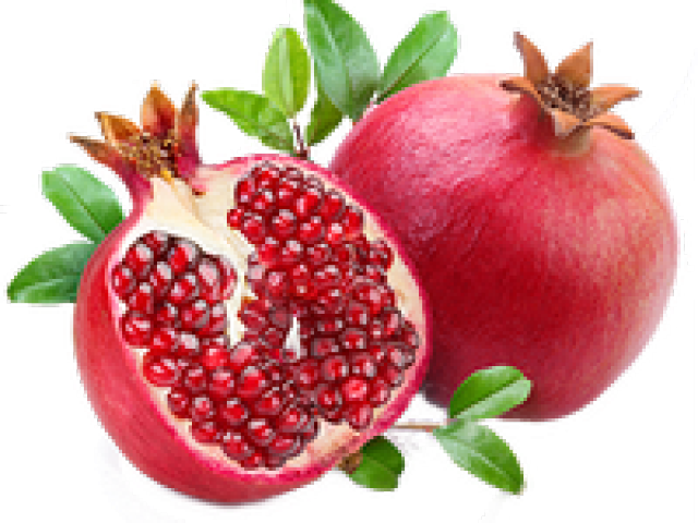 A Pomegranate With Seeds Cut In Half