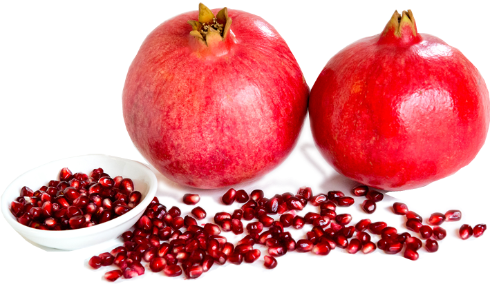 A Pomegranate And A Bowl Of Seeds