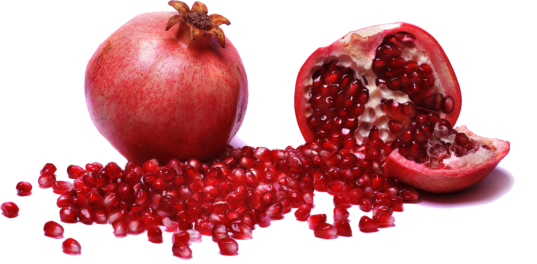 A Pomegranate And A Piece Of Fruit