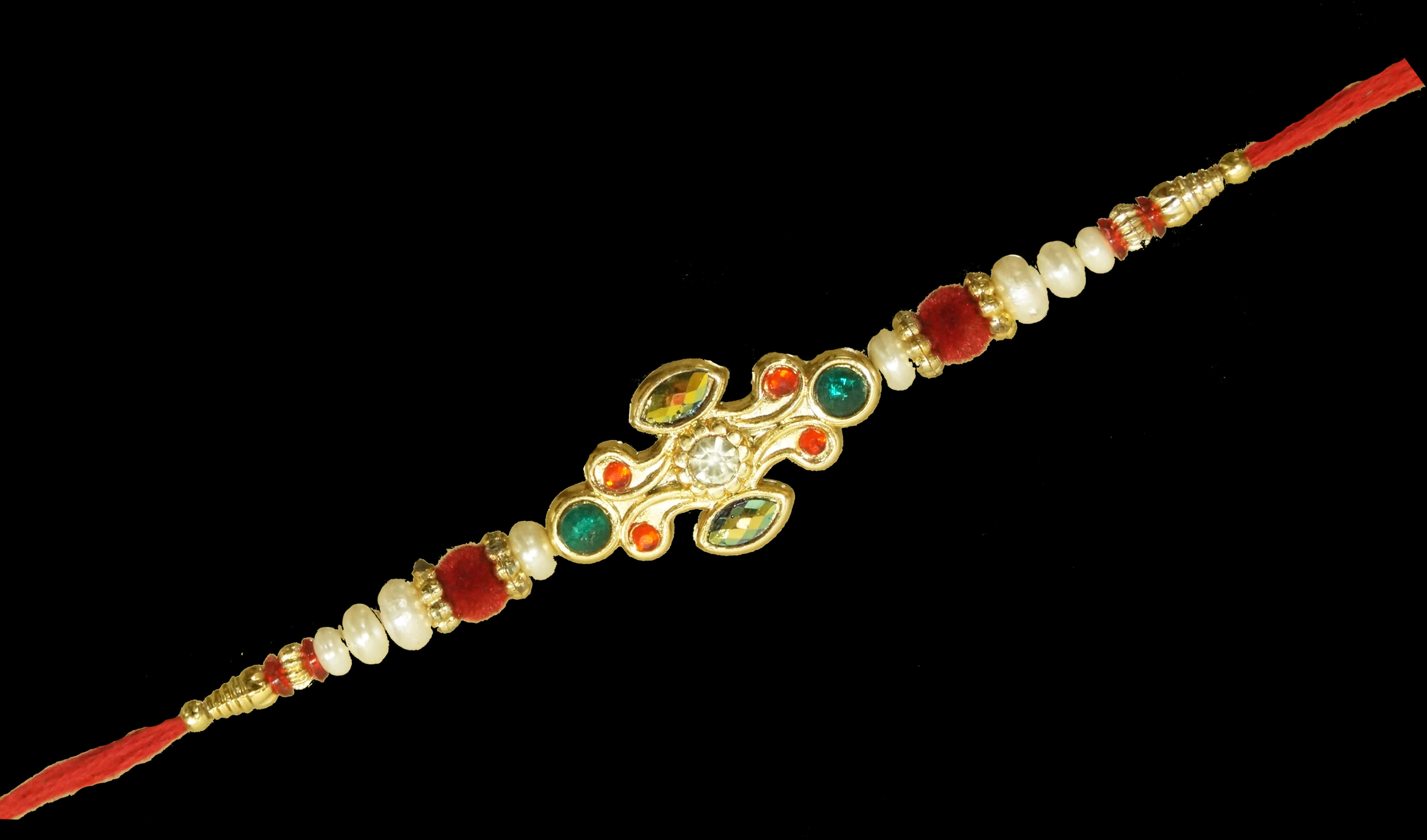 A Gold And Pearl Bracelet With Gems