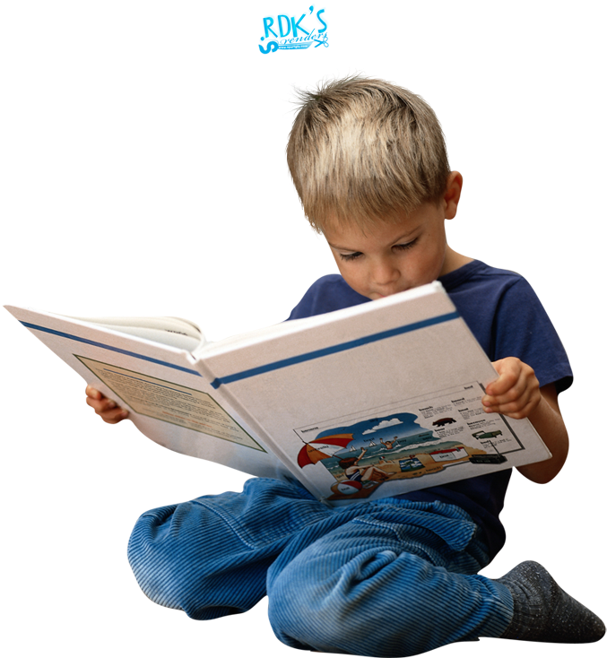 A Boy Reading A Book