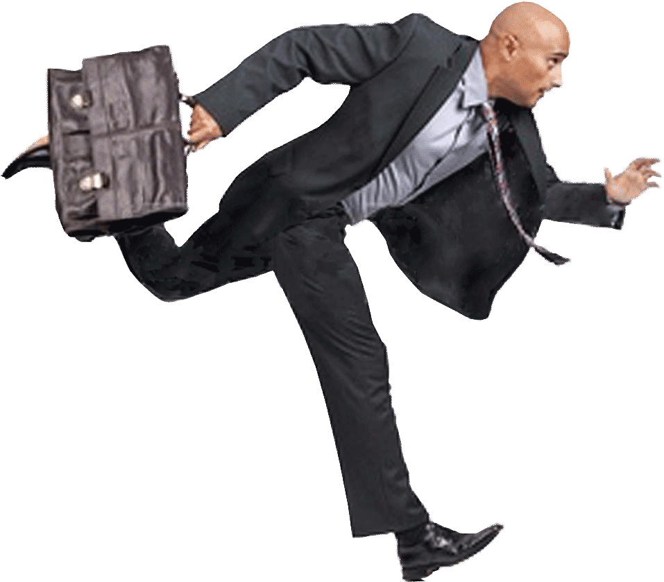 A Man In A Suit Running With A Briefcase