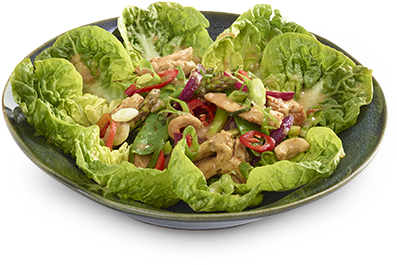 A Bowl Of Salad With Lettuce And Meat