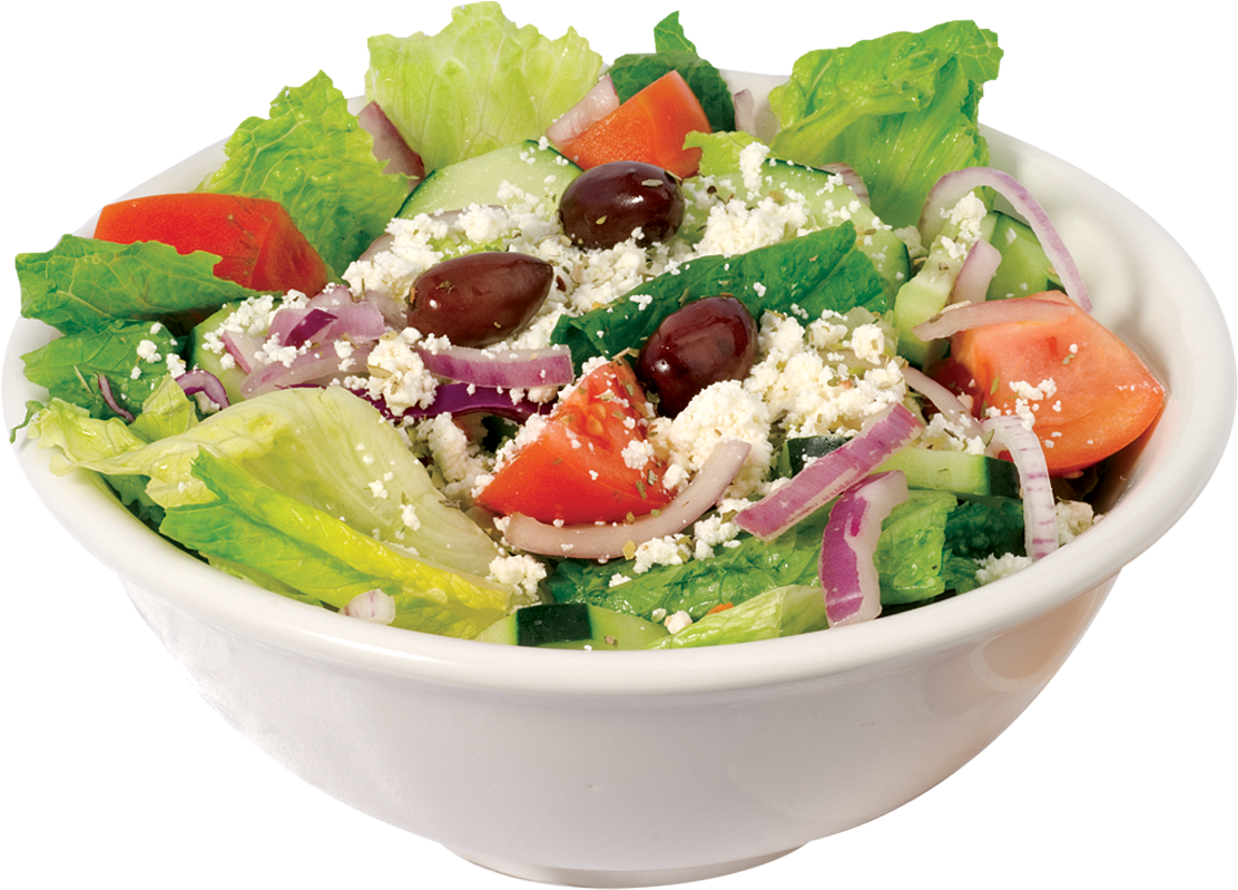 A Bowl Of Salad With Cheese And Vegetables