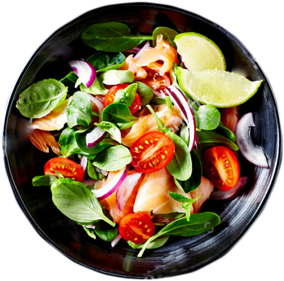 A Bowl Of Salad With Tomatoes And Onions