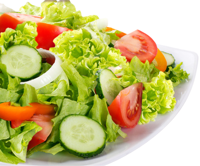 A Plate Of Salad With Tomatoes Cucumbers And Lettuce