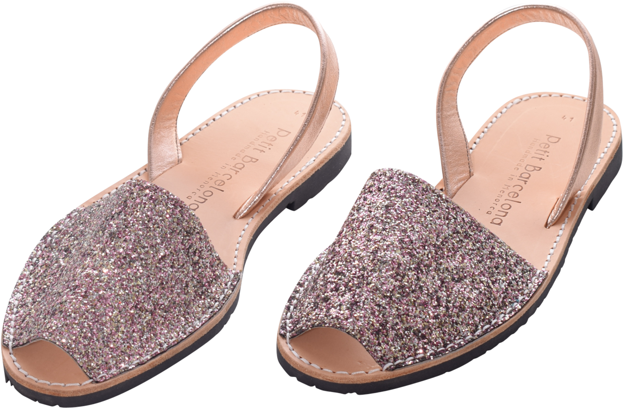 A Pair Of Pink And Silver Glitter Sandals