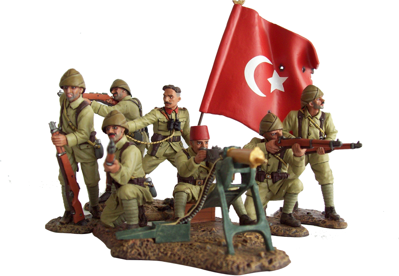A Group Of Toy Soldiers Holding Guns And A Flag